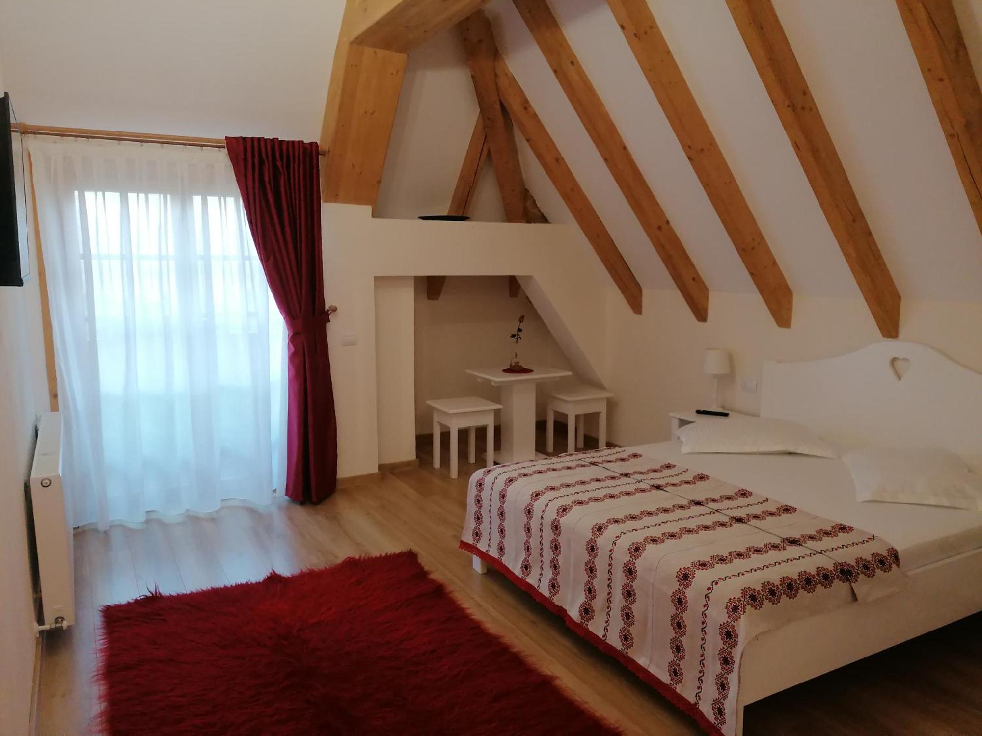 Pensiunea Casuta Din Deal Moisei Habitación foto